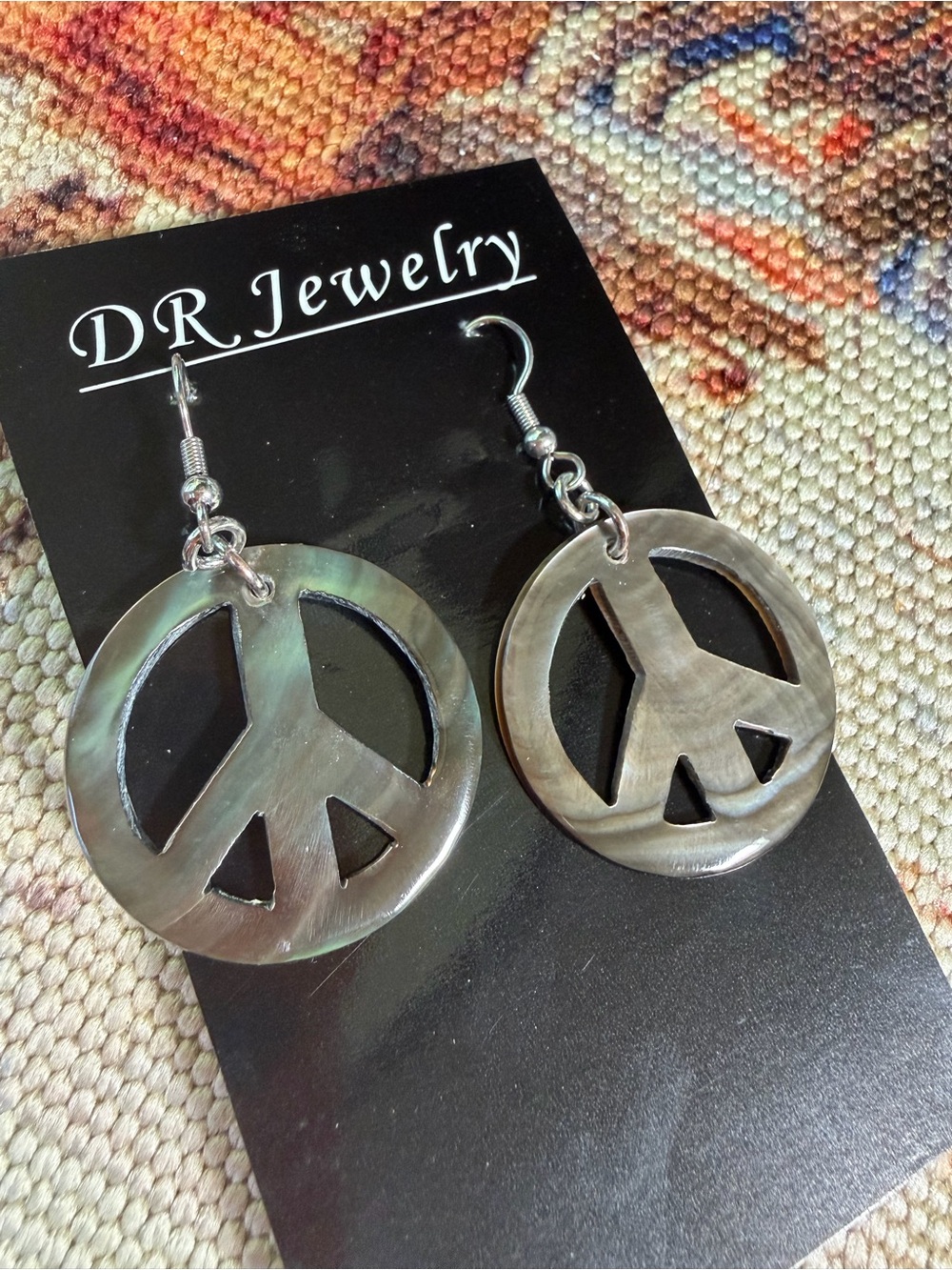 Peace sign symbol round shell earrings